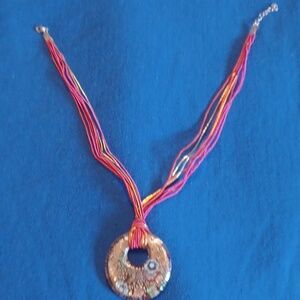 Elegant Gold and Red Pendant Necklace